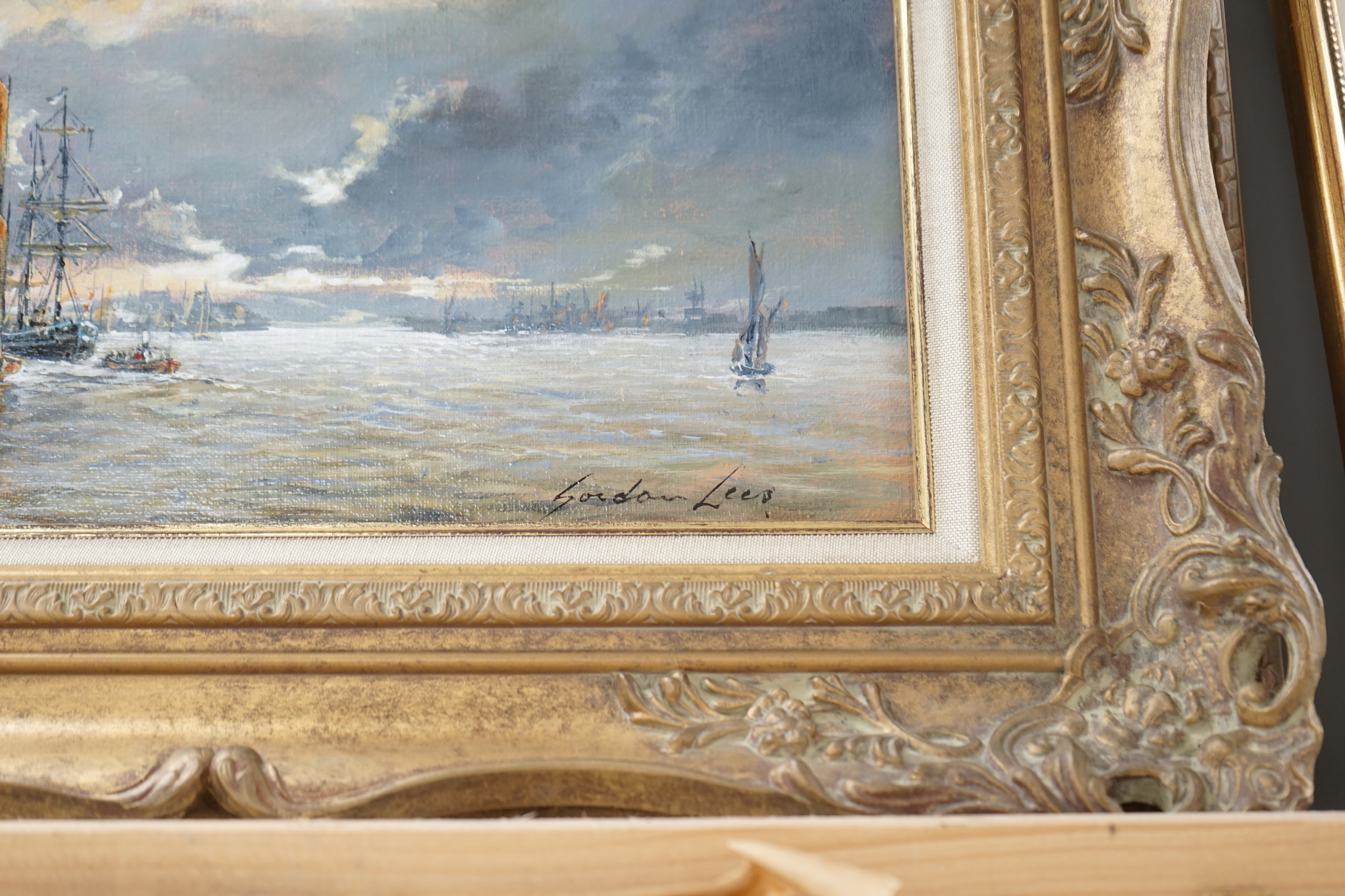 Gordon Lees (b.1933), oil on canvas, Estuary scene with ships, signed, 19.5 x 35cm, ornate gilt framed. Condition - good